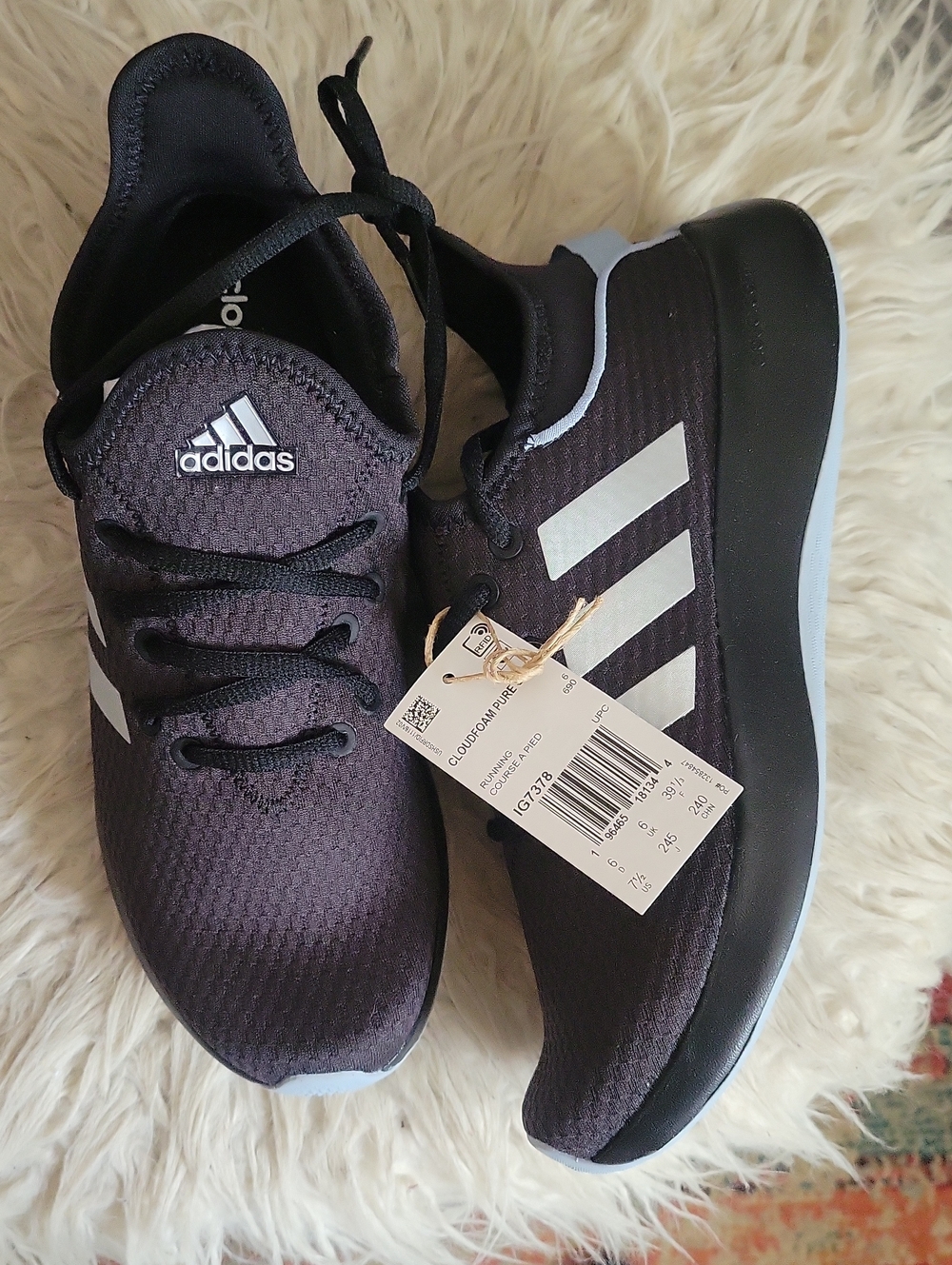 adidas women's Black Athletic Sneakers with White Stripes